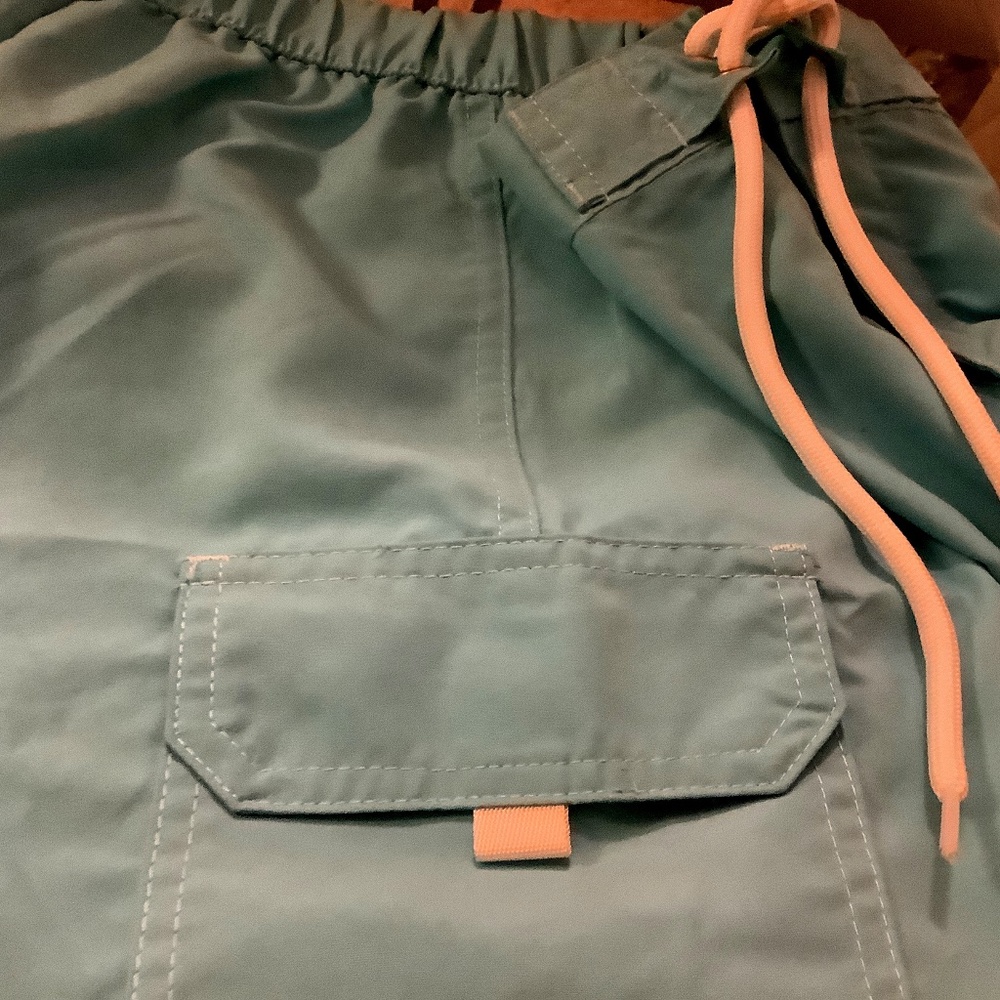 Beachwear shorts with side elastic waste velcro and tie fasten.  🐚☀️🥏